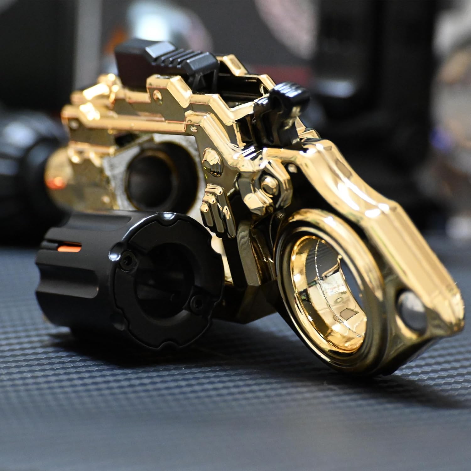 Spinner Gun close-up showing tactile clicks and metal finish.