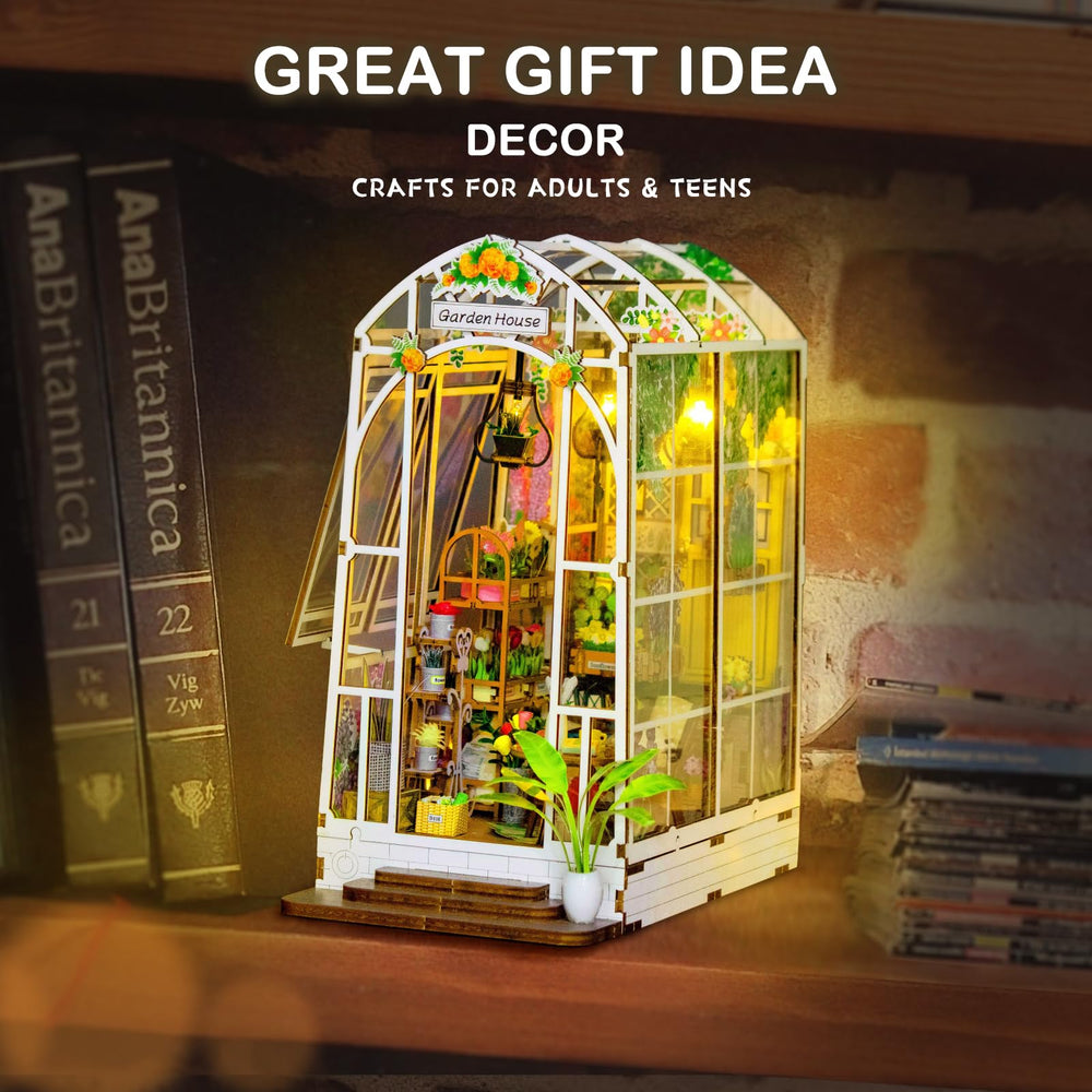 Fimeetoy Book Nook Kit LED light casting warm glow.