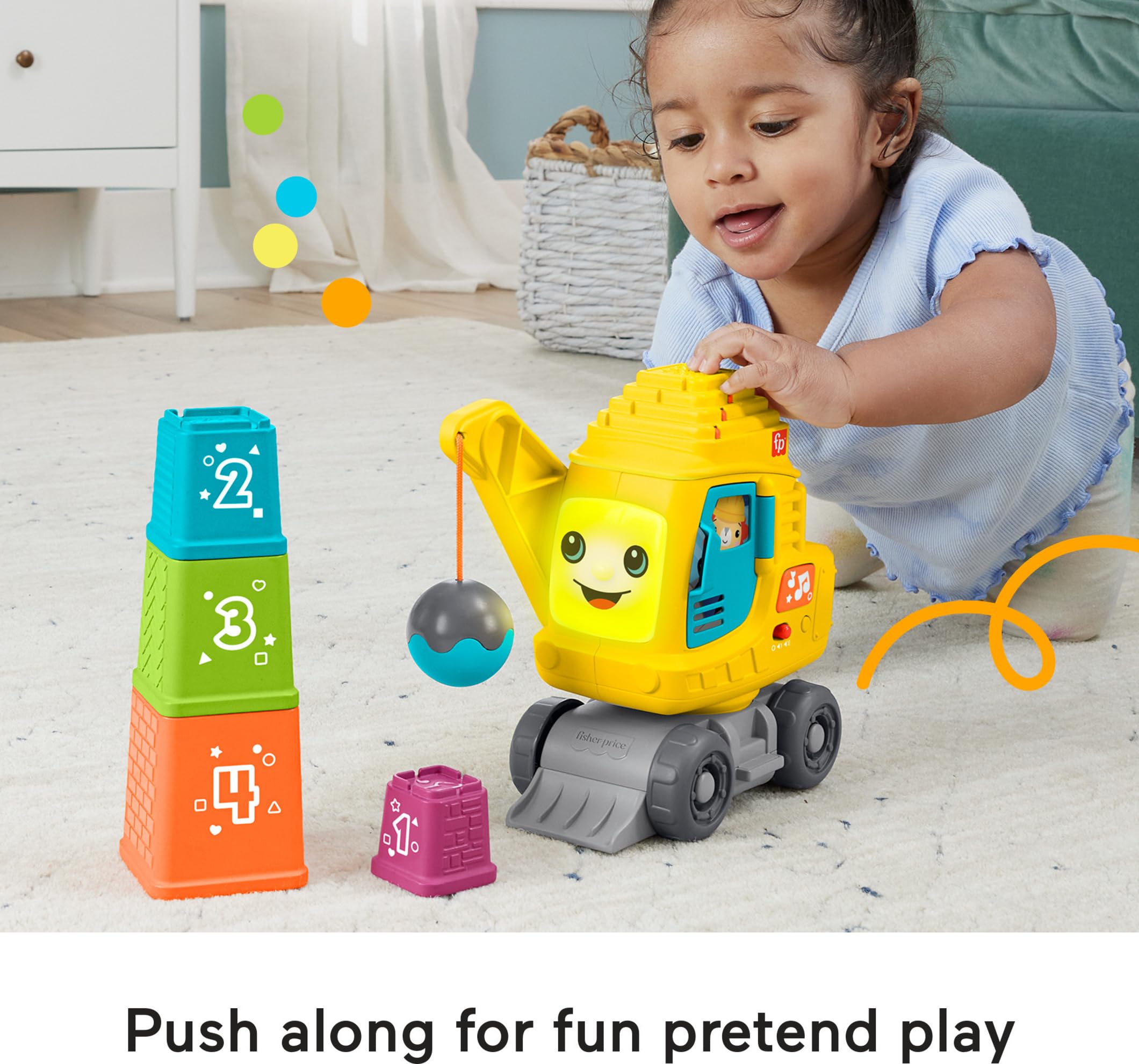 Fisher-Price Count & Stack Crane peek-a-boo door adds interactive lights.