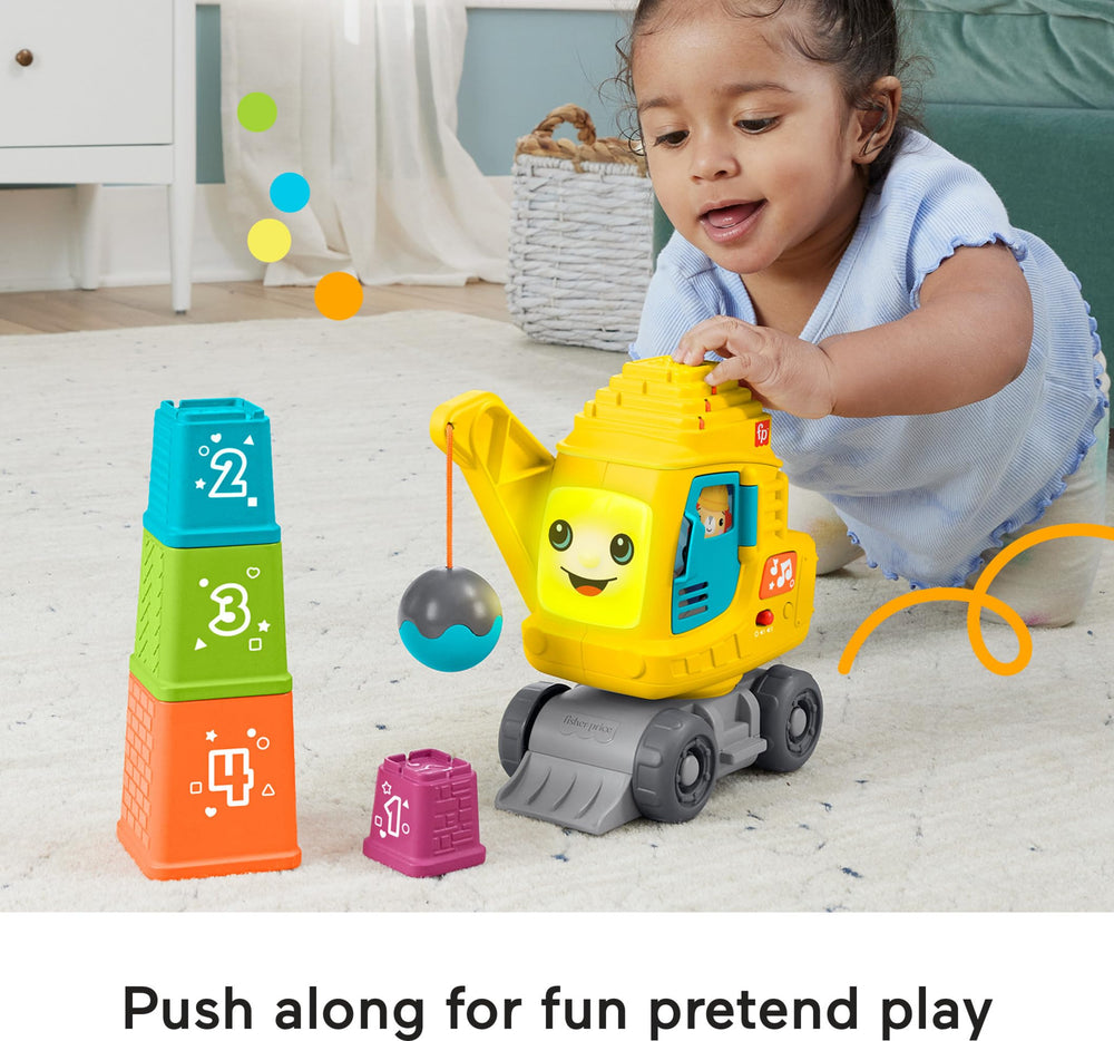 Fisher-Price Count & Stack Crane peek-a-boo door adds interactive lights.