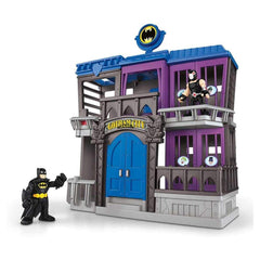 Fisher-Price Imaginext Gotham City Jail Bane figure glowing red eyes during power-up
