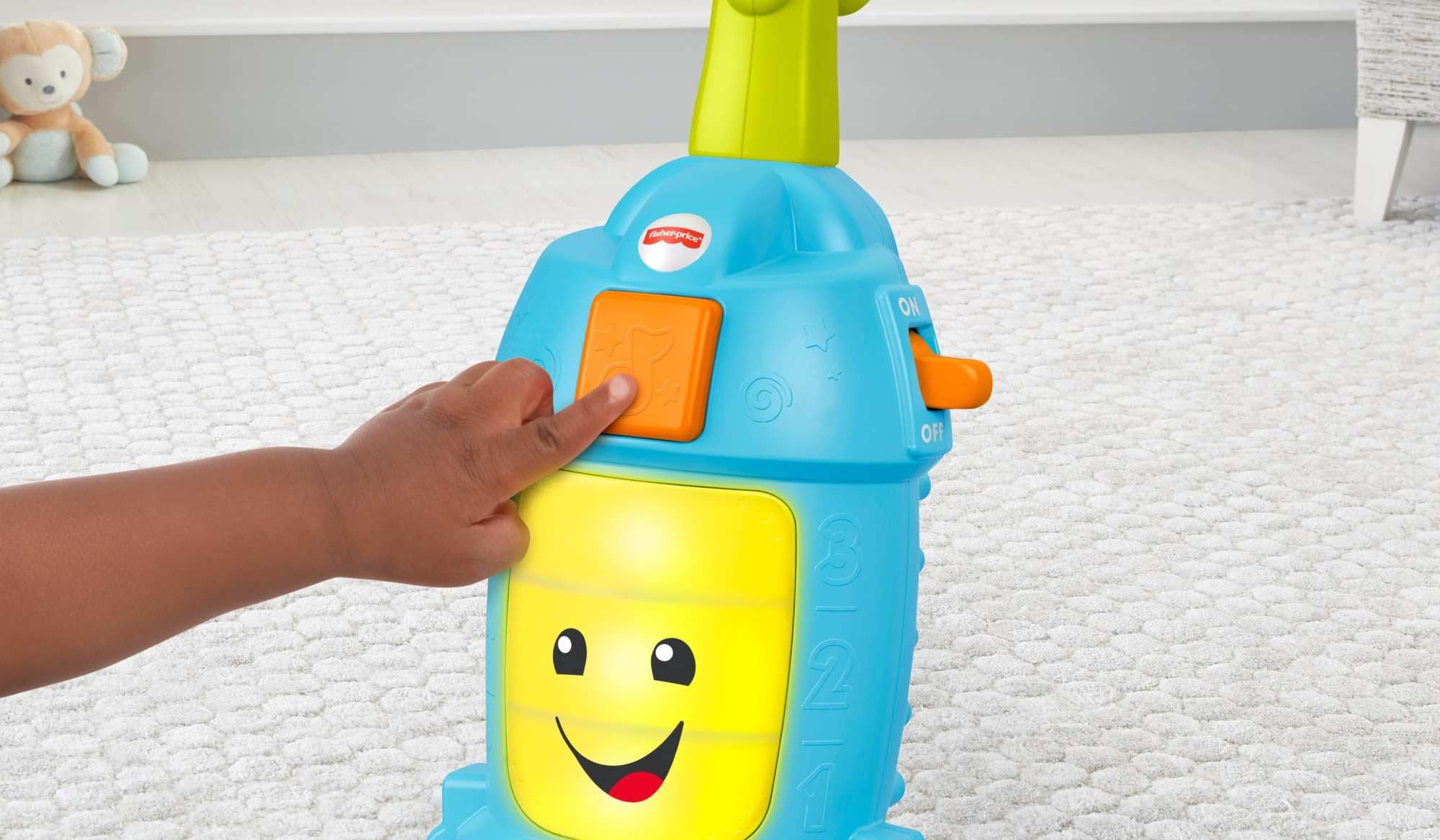 Fisher-Price Laugh-and-Learn vacuum educational phrases engage toddlers