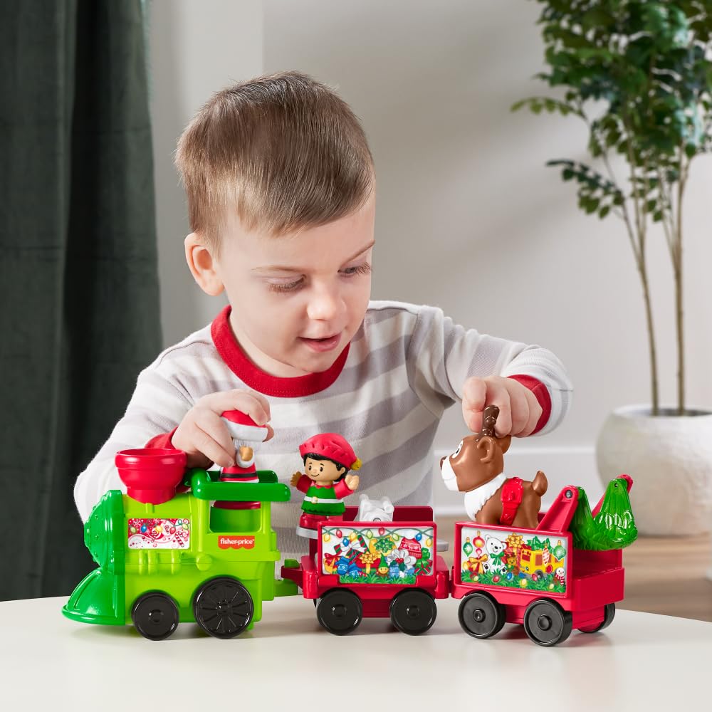 Fisher-Price Little People Christmas Train conductor seat press triggers festive tunes.