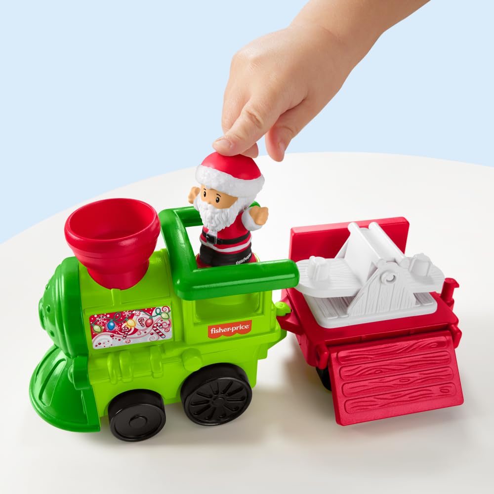Fisher-Price Little People Christmas Train rolling action invites car play.