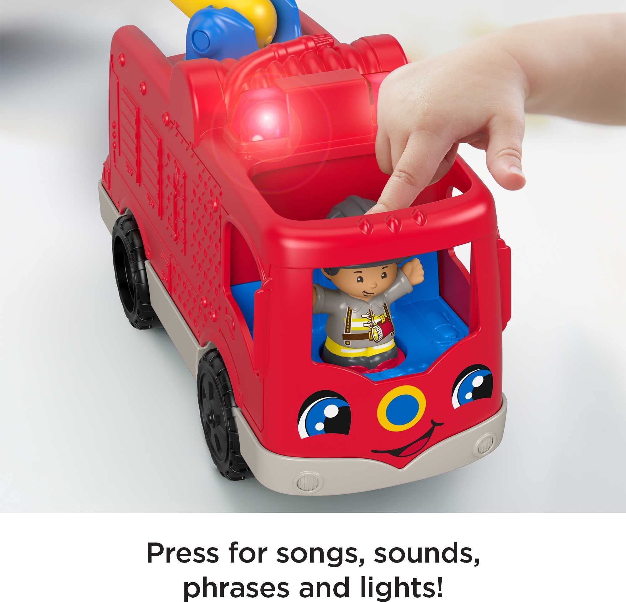 Fisher-Price Little People fire truck rolls smoothly for active pretend missions.