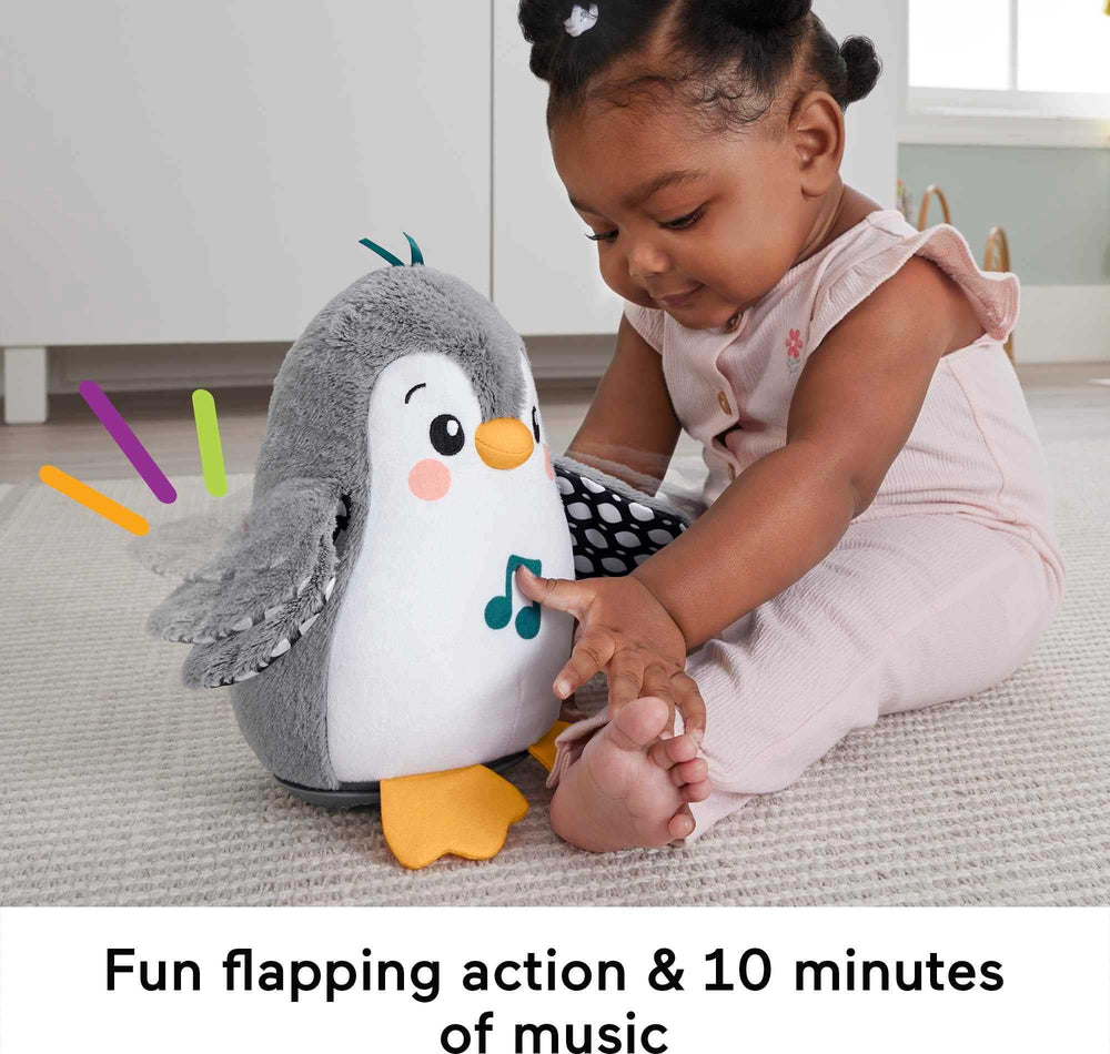 Soft plush penguin for tummy time and gentle tactile exploration.