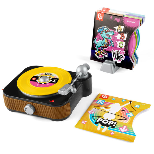 Fisher-Price Rockin’ Record Player turntable in action inspires imaginative play.