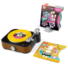 Fisher-Price Rockin’ Record Player turntable in action inspires imaginative play.