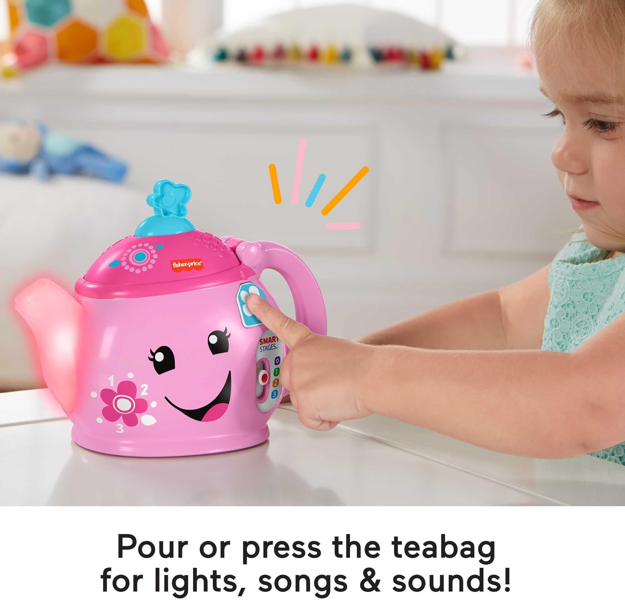 Fisher-Price tea set tray with puzzle treats encourages fine motor skills.