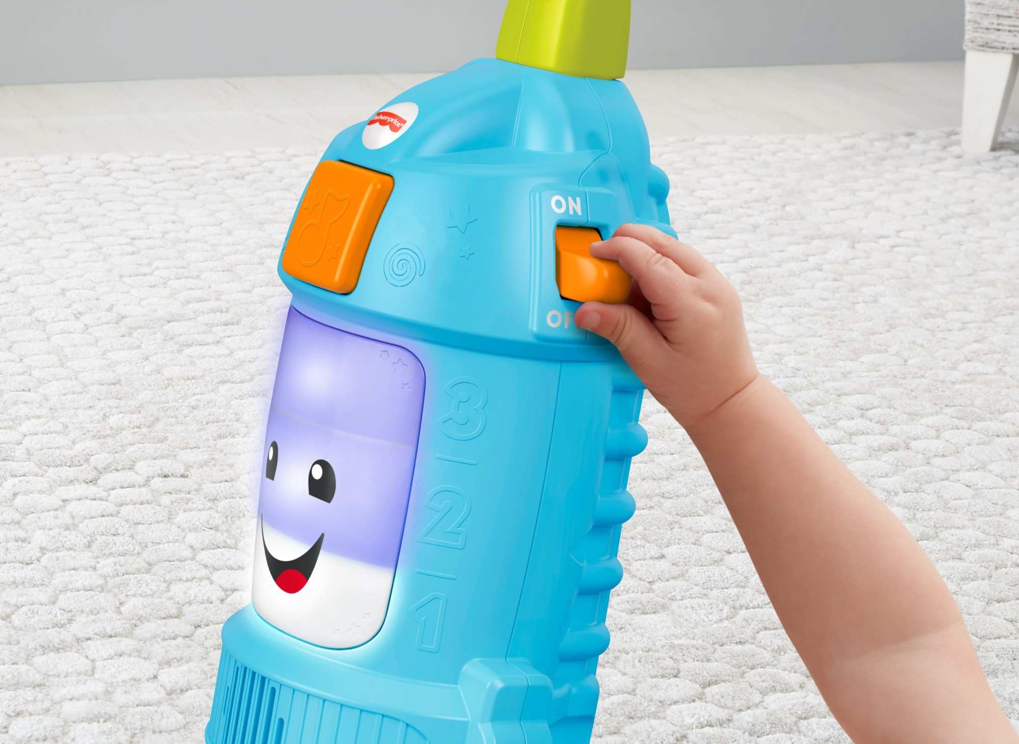 Fisher-Price vacuum toy with tilt-adjustable handle for comfy play