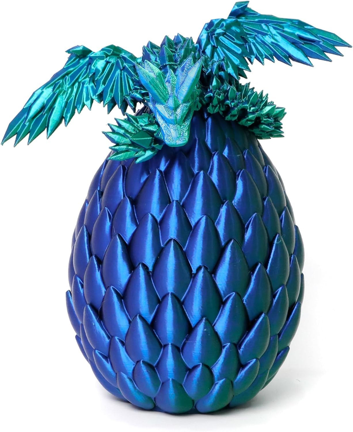 Flavery dragon in egg large surprise on desk display with green-blue color.