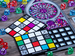 Floodgate Sagrada player boards display stained-glass layouts for thoughtful placement