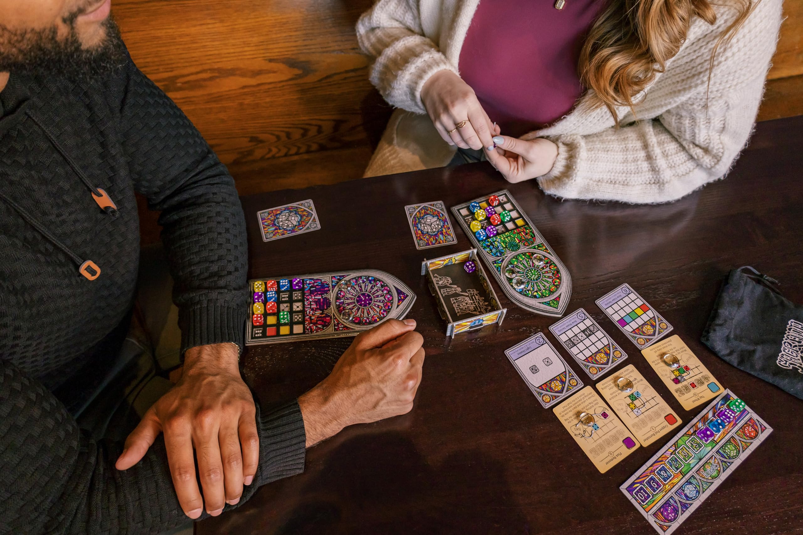 Sagrada stained-glass-patterns highlight color and shade choices during rounds