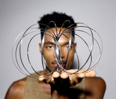 Toroflux folds flat and pops open for surprising motion.