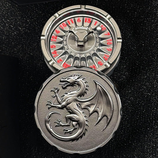 FLUEFOWL dragon-metal dice close-up showing engraved numbers for precise outcomes.
