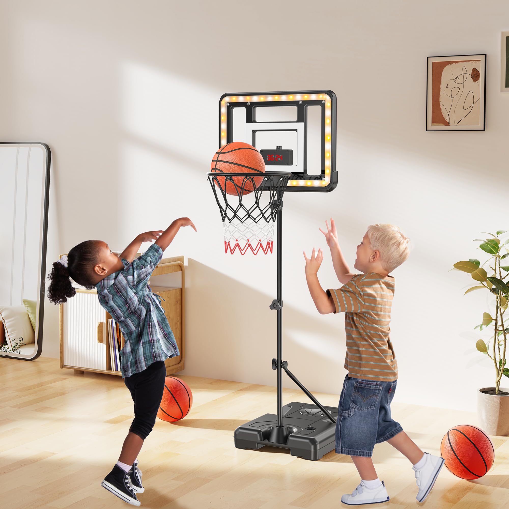 FlyBakiz kids basketball hoop backyard play with a kid shooting.