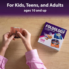 Foldology travel-size box demonstrates compact 5x5 inch footprint for portability.