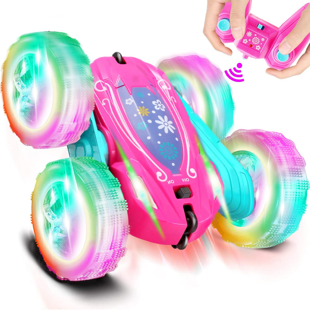 FREE TO FLY pink RC car side view showing compact indoor-ready design