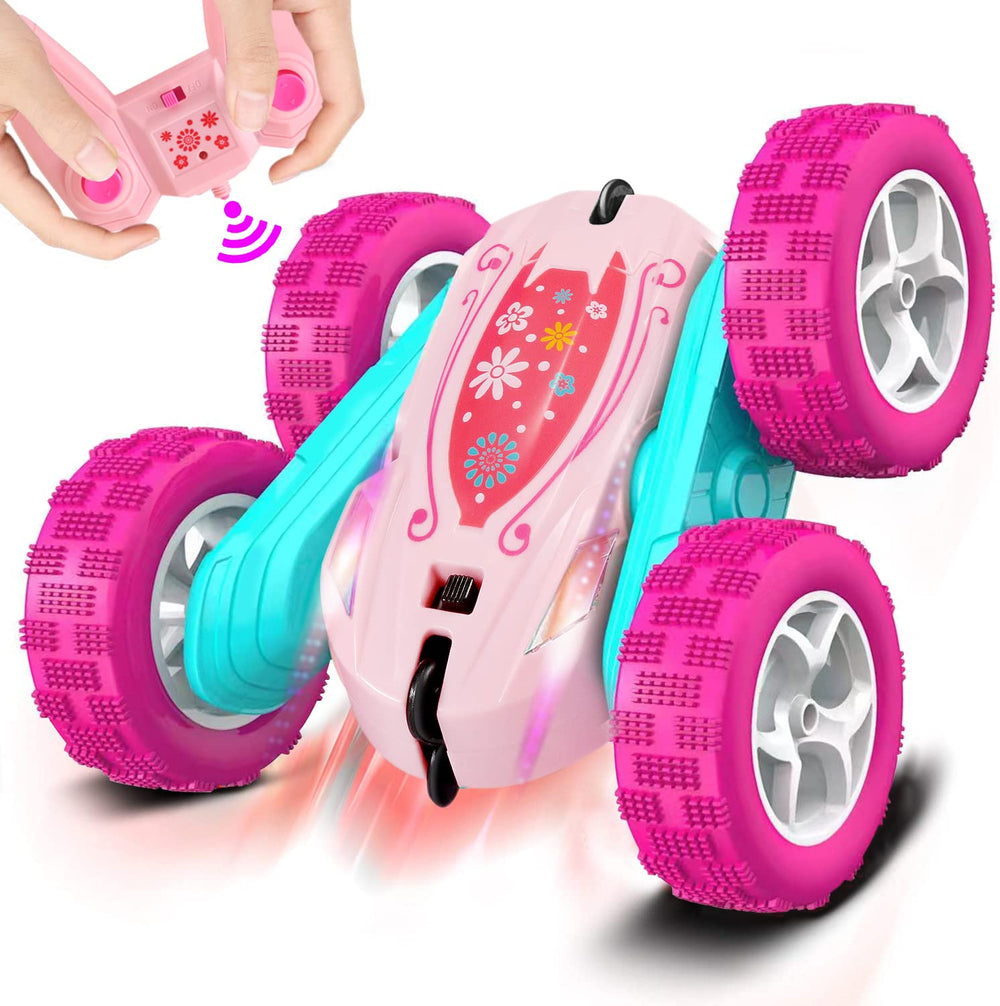 FREE TO FLY RC stunt car performs 360-degree flip on a smooth surface.
