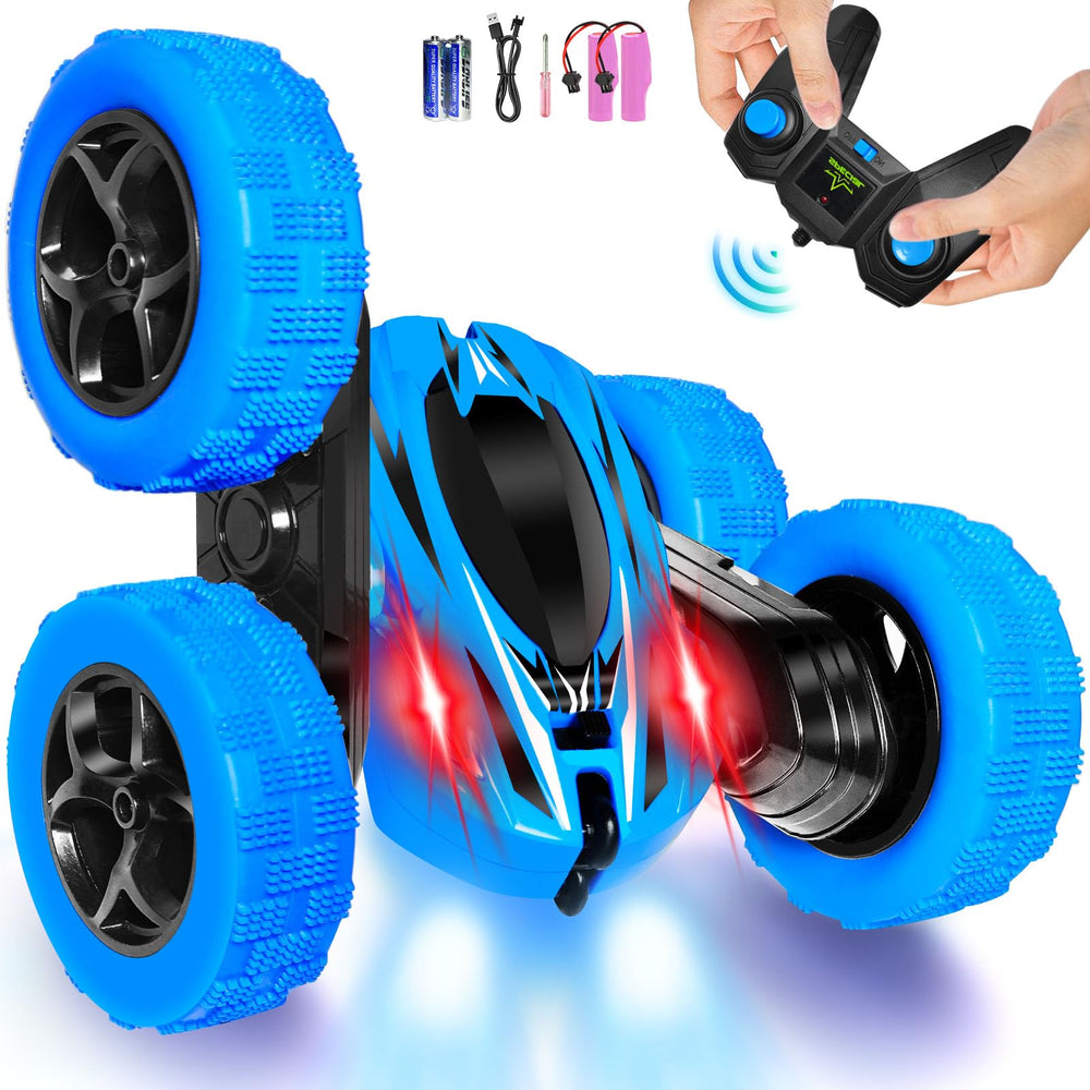 FREE TO FLY remote control car performing a 360 flip on a smooth surface.