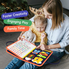 Freebear Busy Board sensory fabric for tactile exploration.