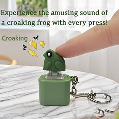 Frog Croaking Fidget Toy clipped to a backpack during travel.