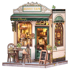 Fsolis Book Nook Kit sunny cafe scene on a bookshelf for cozy reading