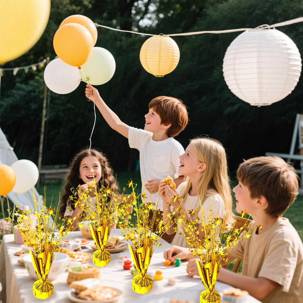 FUBININA gold star spray centerpiece creates festive ambiance.