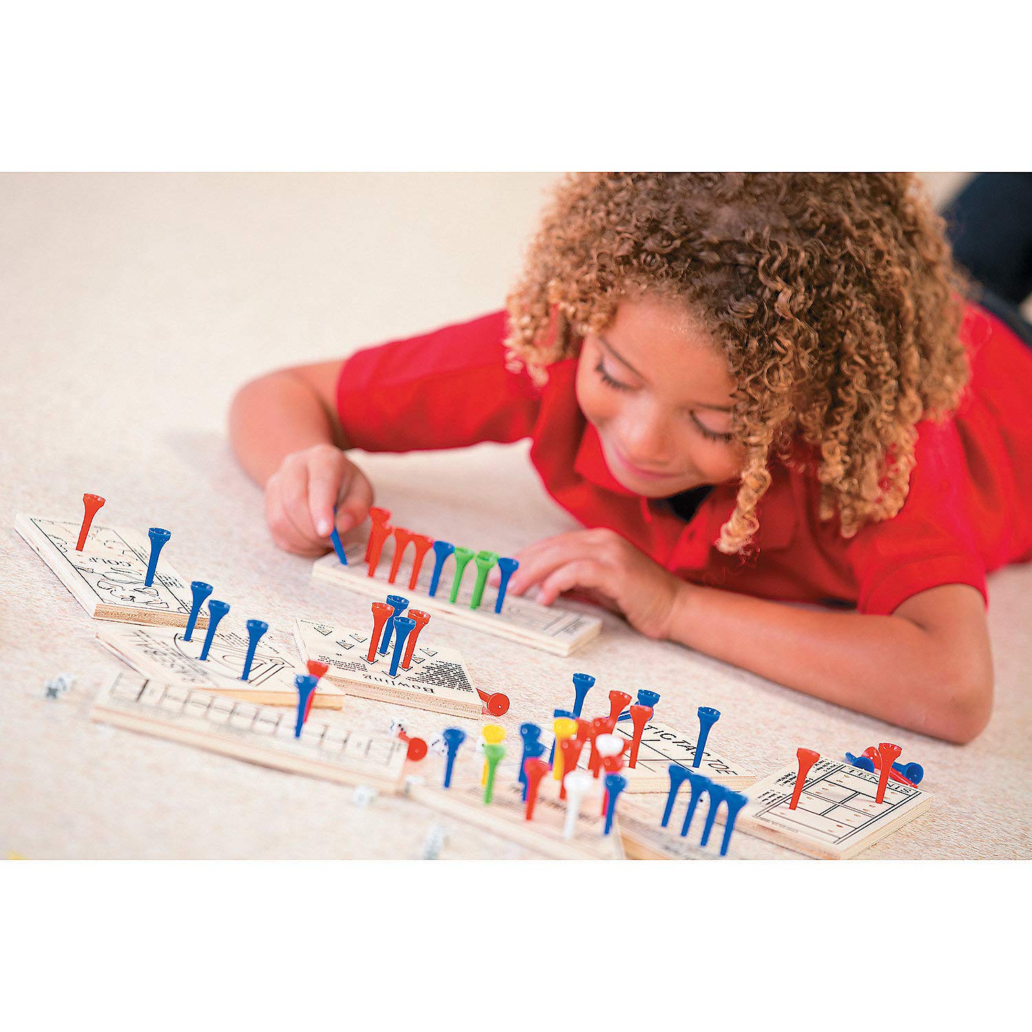 Fun Express travel-friendly wooden boards in use during road trip or camping downtime.