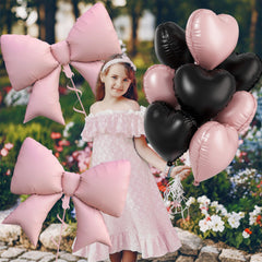 FunHot large pink bow balloon stands out as a centerpiece.