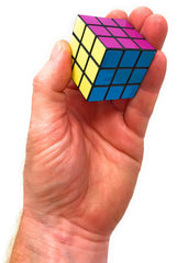 Funiverse bulk 24-pack puzzle cubes in hands, beginner-friendly 3x3 configuration.