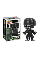 Funko Pop Movies Alien figure on a display shelf, ideal for collectors.