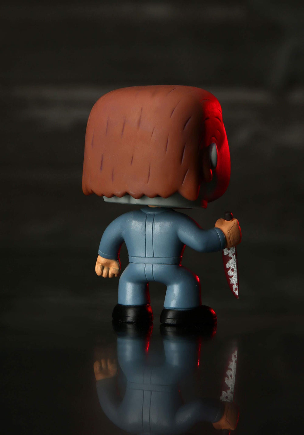 Side view of Funko Michael Myers blue Pop! for shelf styling.