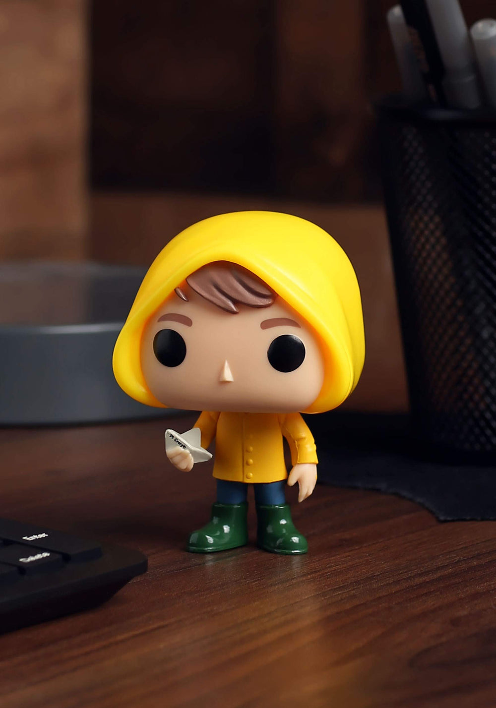 Funko POP! IT Georgie with Boat side profile, show off unique style on shelves.