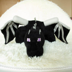 11.8-inch dragon plush that travels well for trips and car rides.
