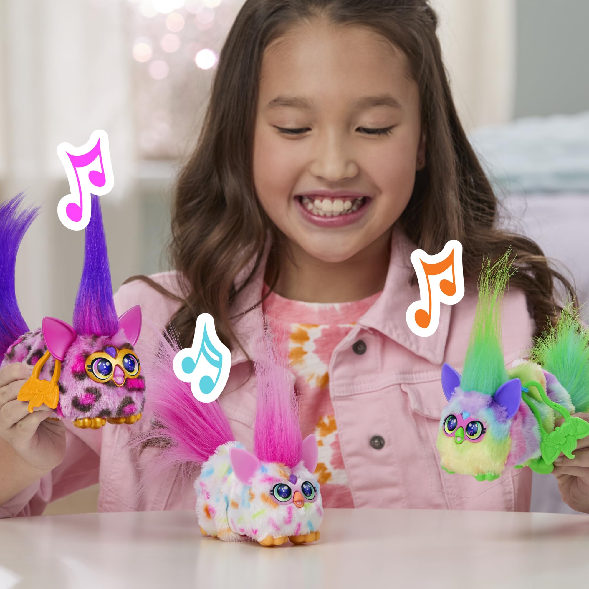 Furby DJ Furblets mouth noises illustrate fun feeding sounds during pretend play.