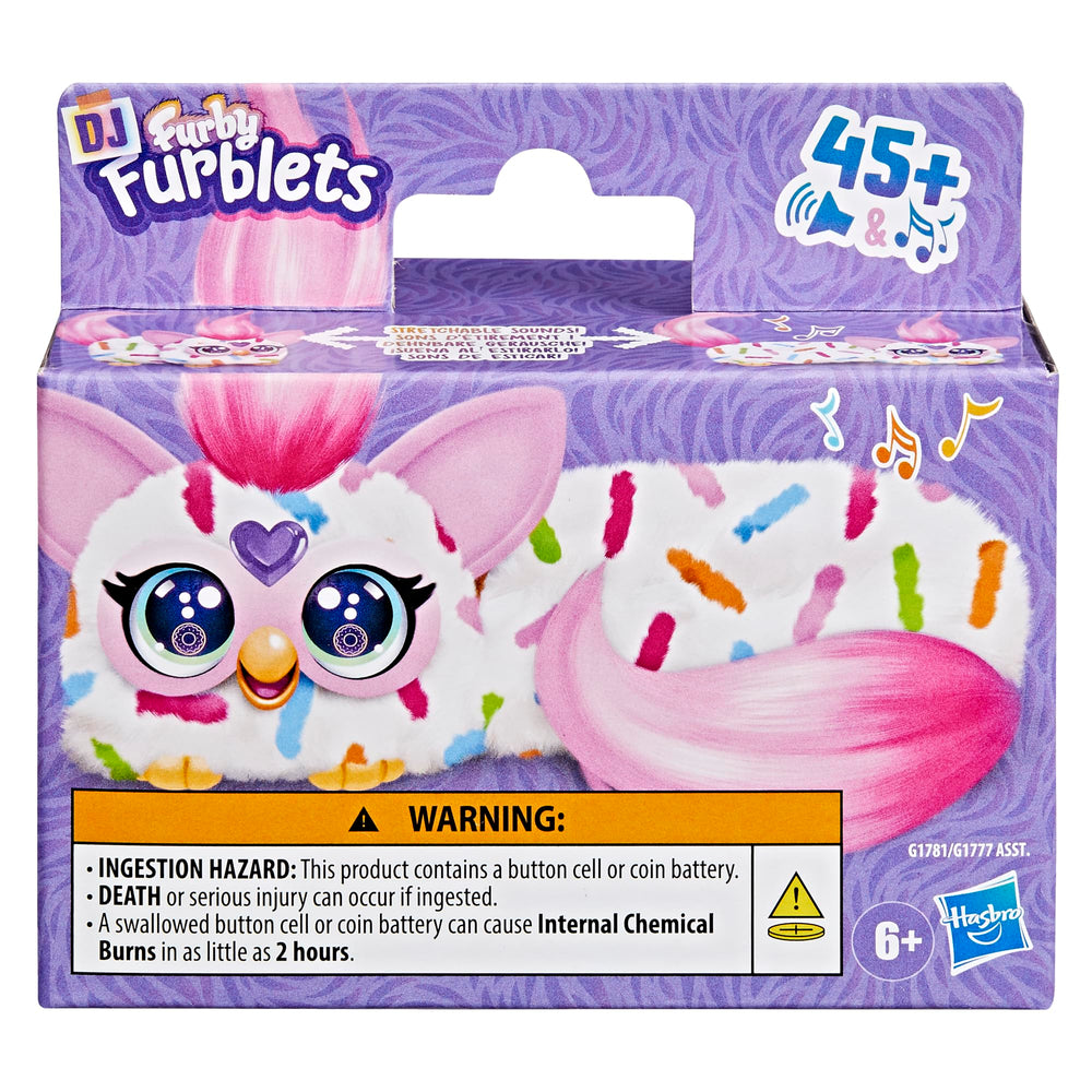 Furby DJ Furblets stretch action demonstrates silly sounds during imaginative play.
