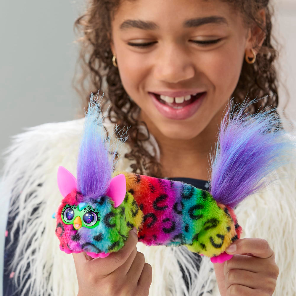 Furby DJ Furblets stretches to start songs for giggly moments.