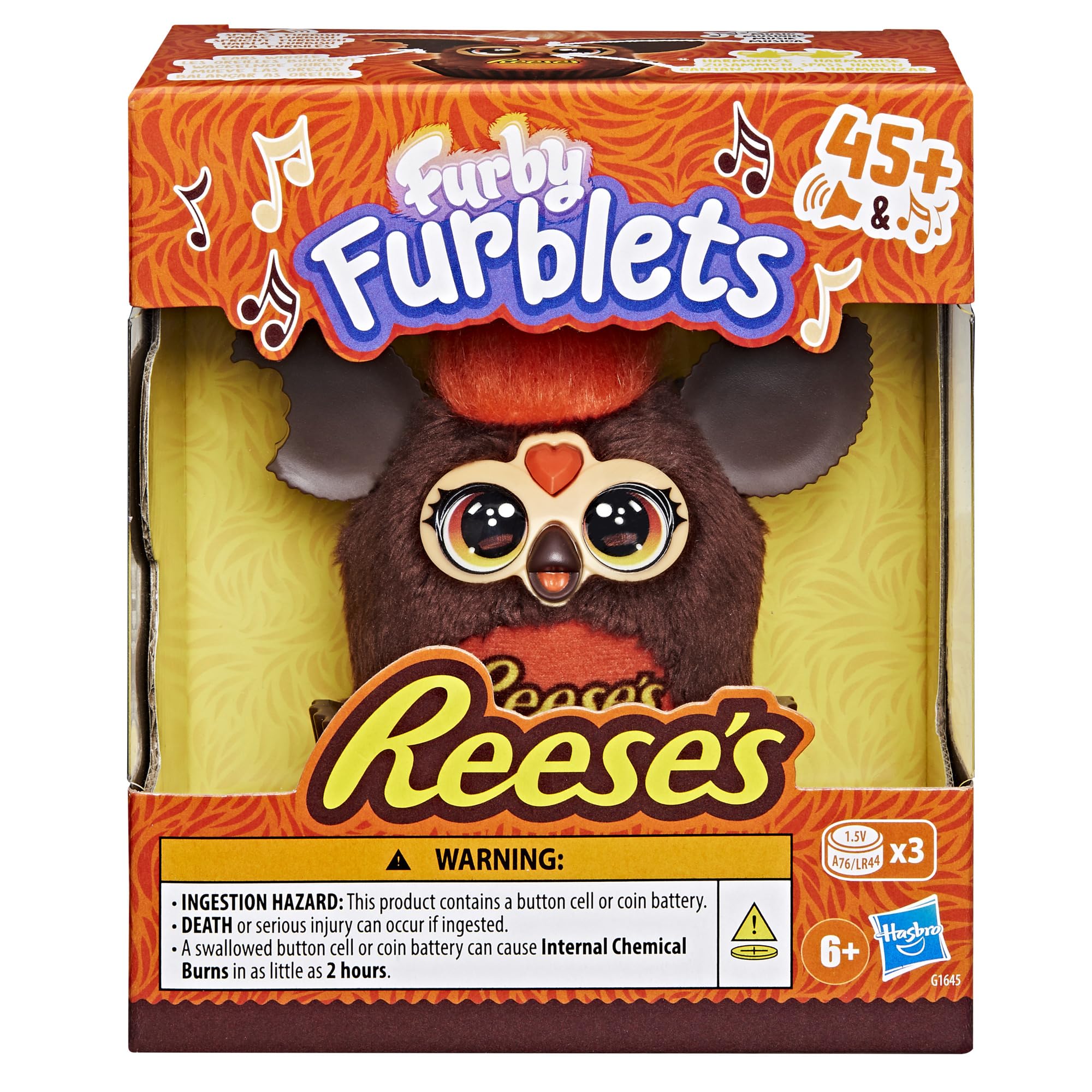 Furby Furblets top head button area emits amusing sounds during play.