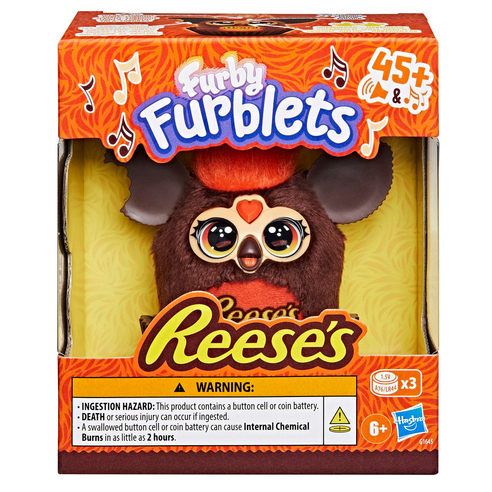 Furby Furblets top head button area emits amusing sounds during play.
