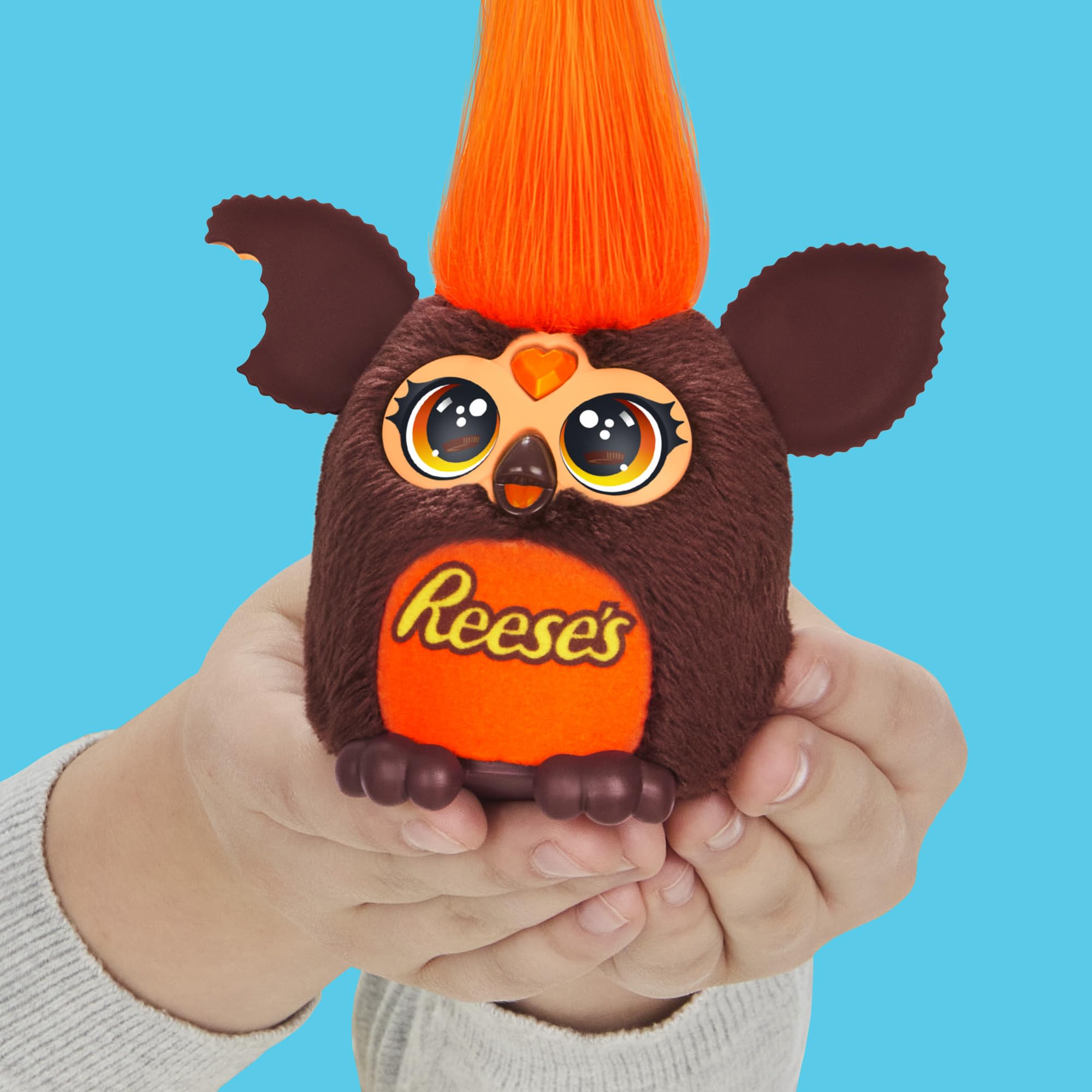 Furby Furblets wiggle ears candy-inspired charm during pretend play.
