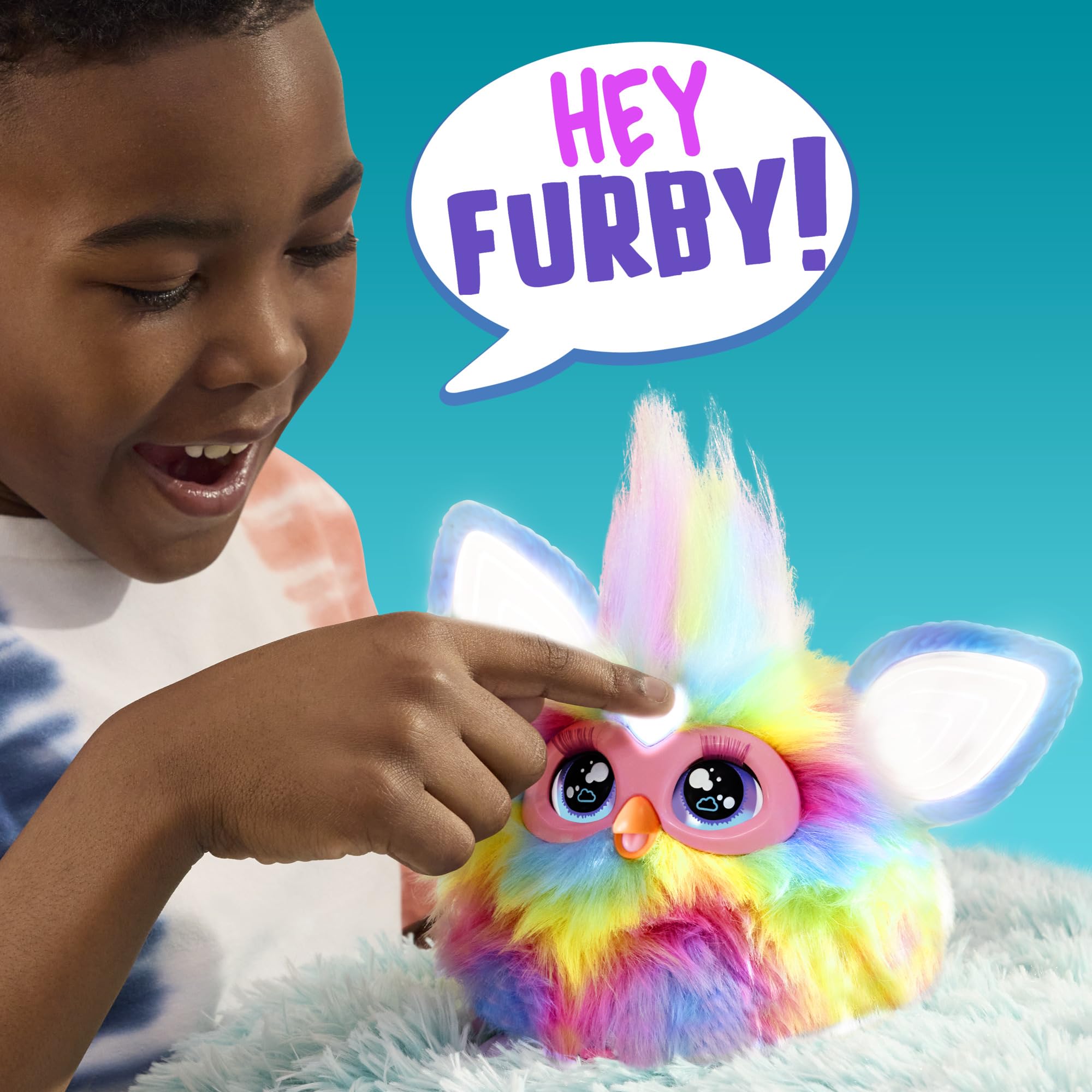 Furby interactive plush face responds to kids actions.