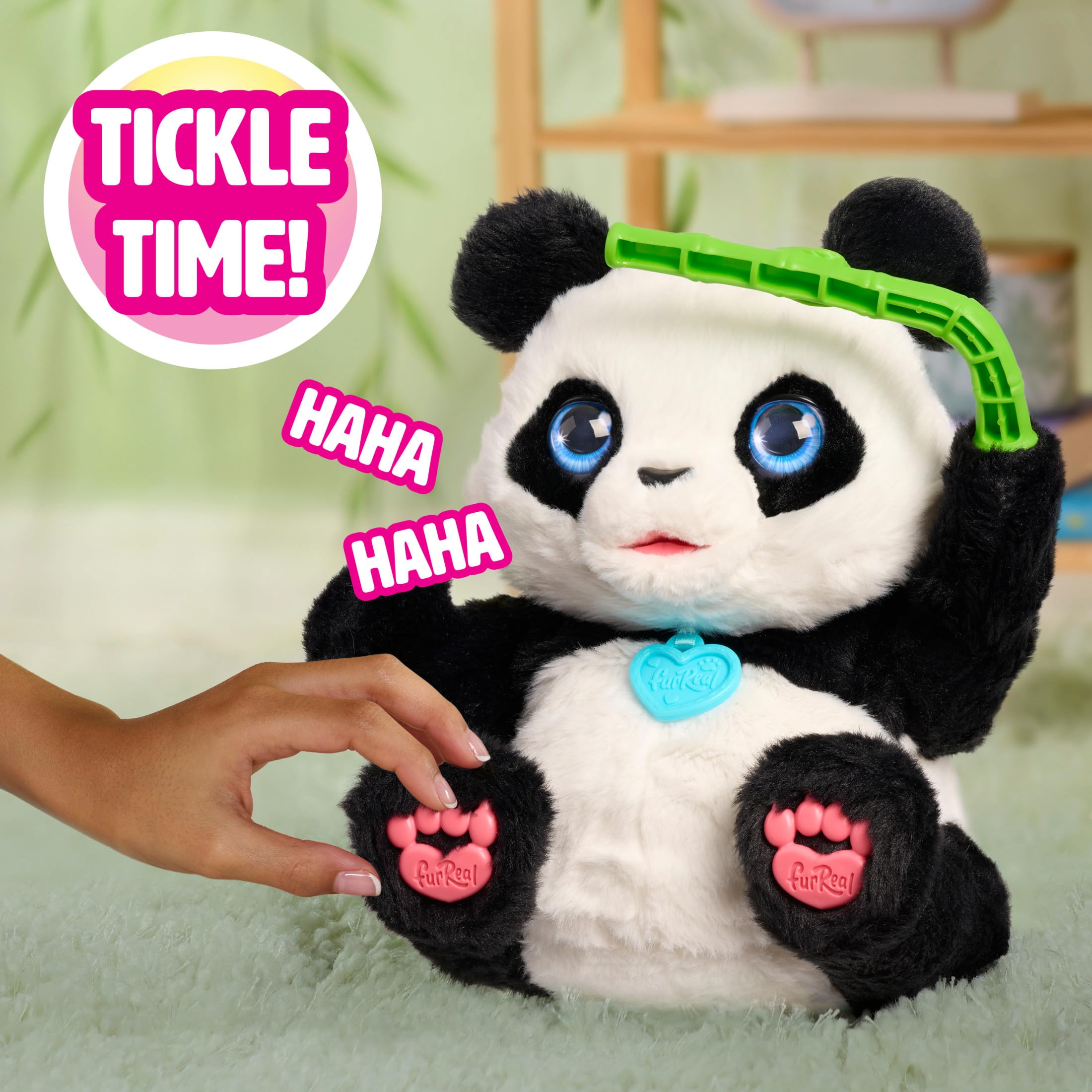FurReal Coco holding bamboo shoot accessory to illustrate snacking sounds and role play