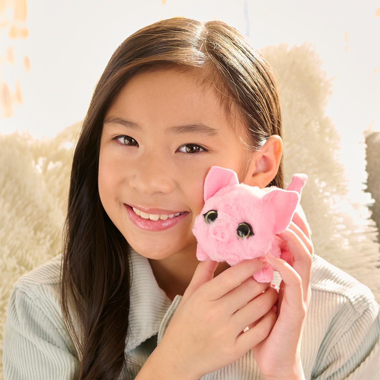 furReal piglet closeup of sparkly green eyes and soft fur for tactile appeal