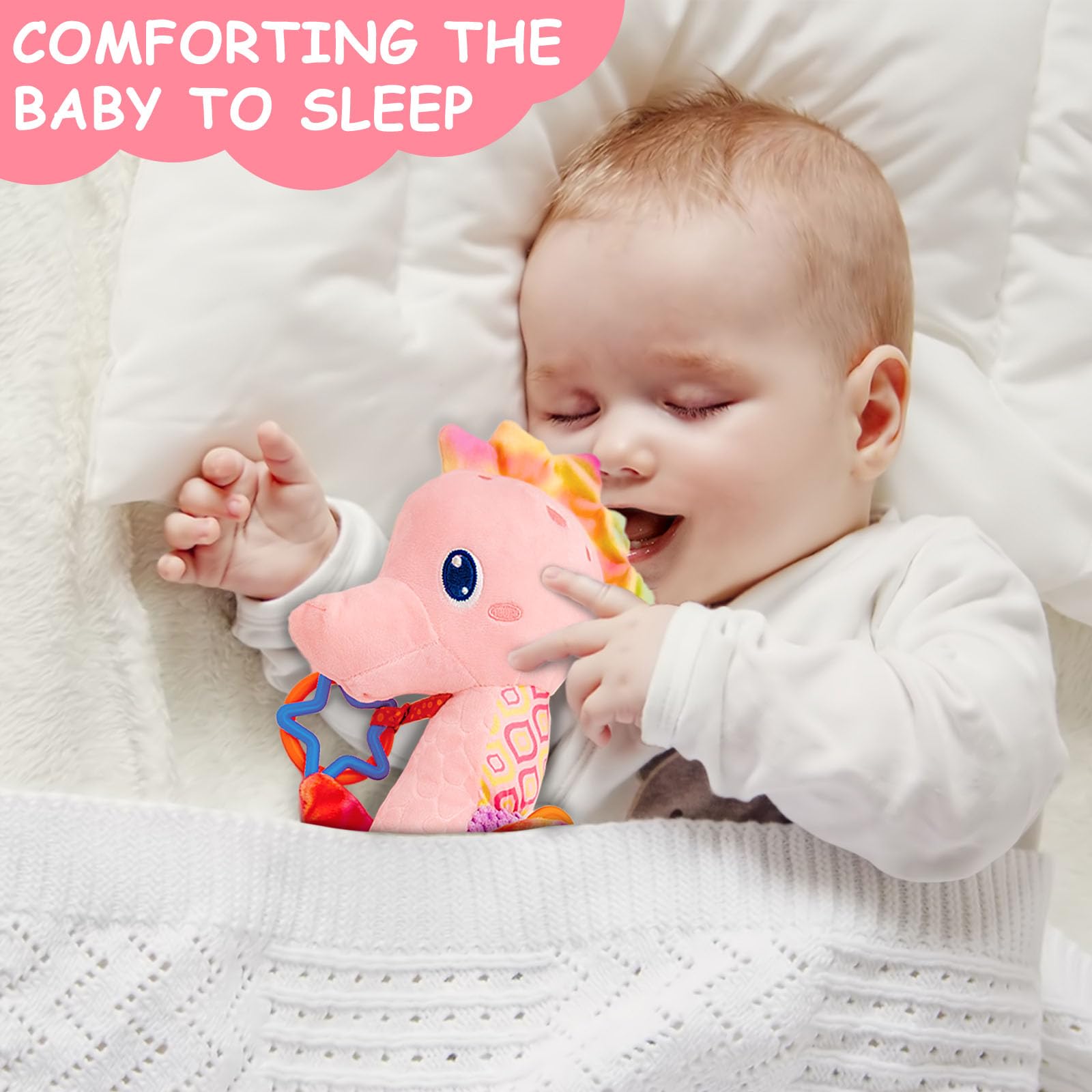Baby holds the Fuzqq seahorse plush during play and cuddle time