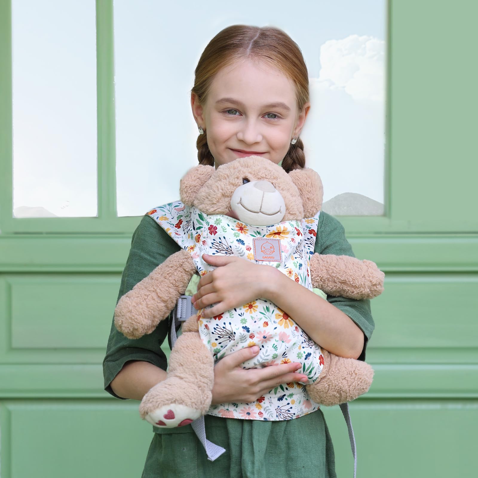 GAGAKU doll carrier side wear showing three carrying styles for flexible play
