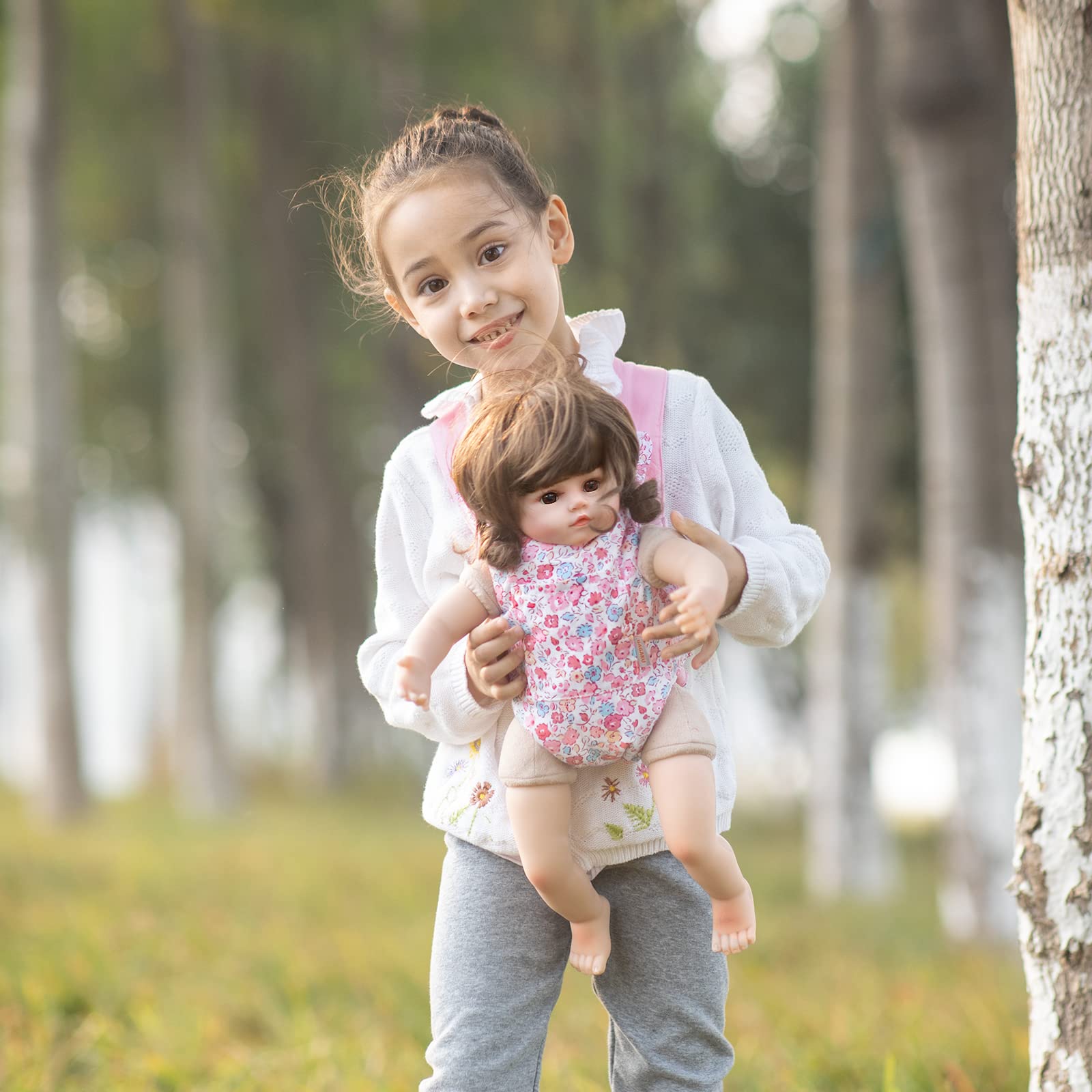 GAGAKU carrier uses snap fasteners for quick on/off doll wearing.