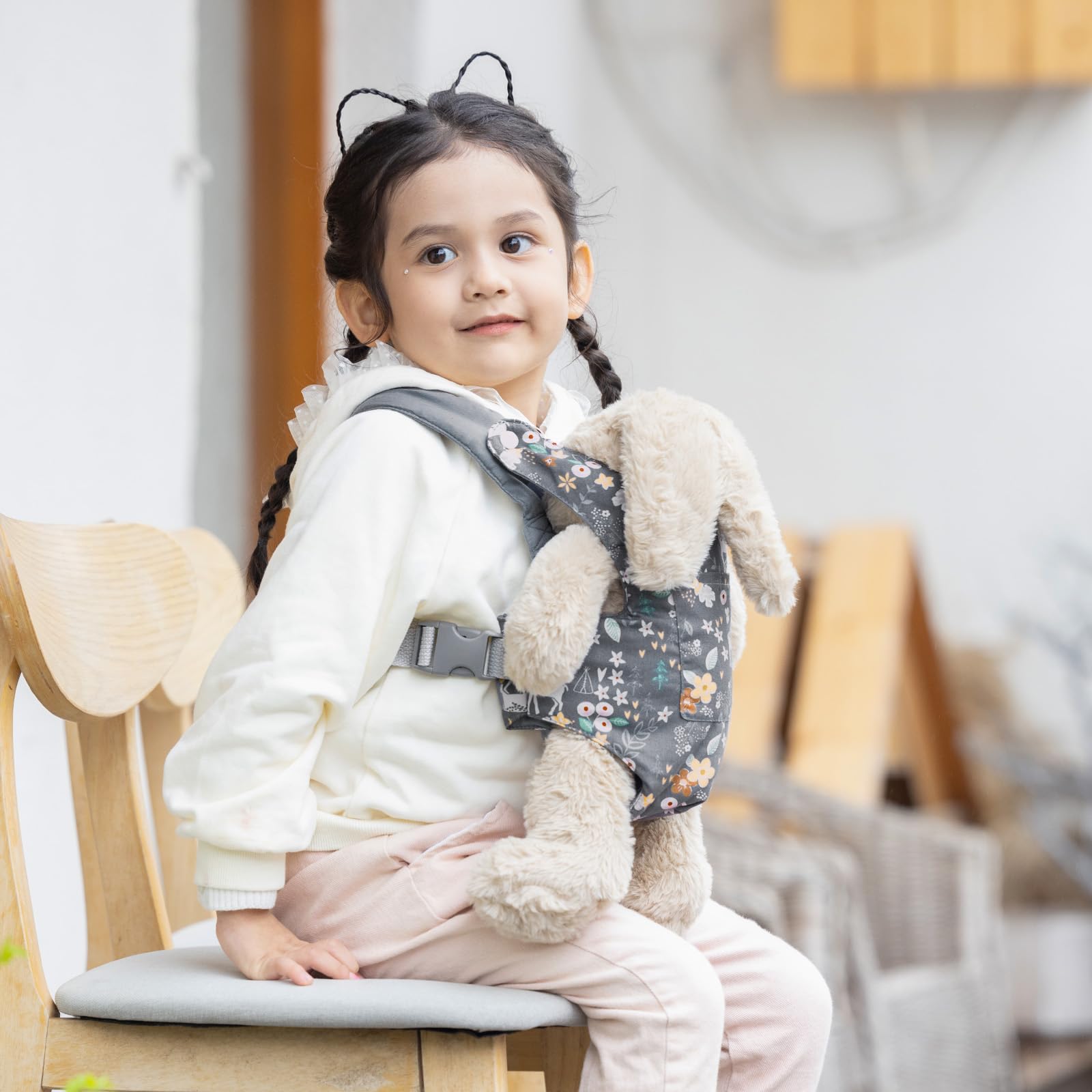 GAGAKU toy baby carrier gray deer with adjustable shoulder straps for secure, comfortable play.