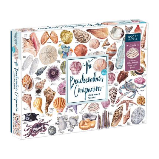 Galison Beachcomber's Companion shell-pieces on the table for family puzzle time.