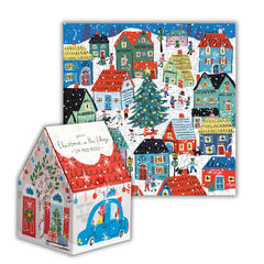 Galison Christmas in The Village house-shaped box ready for gifting.